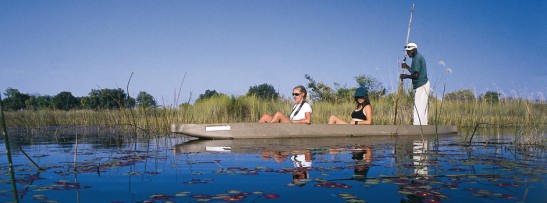 On a mokoro in the Okavango Delta, Botswana
