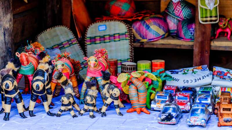 Handcrafted goods and curios on display at a local market stall in Antananarivo
